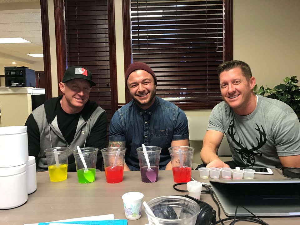 Flavor testing session with sample cups